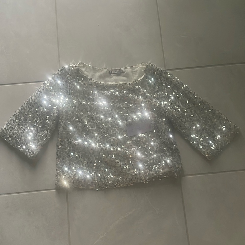 J Lo size L silver sequin top